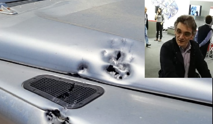 L'auto sforacchiata dai proiettili e Giovanni Di Lorenzo