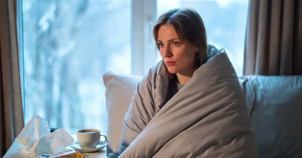 Donna con l'influenza K.